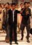 Manish Malhotra with models in his creation.jpg